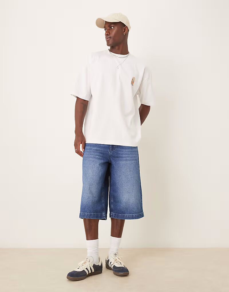 Удлиненные джинсовые шорты ASOS DESIGN темно-синего цвета 
Удлиненные джинсовые шорты ASOS DESIGN темно-синего цвета