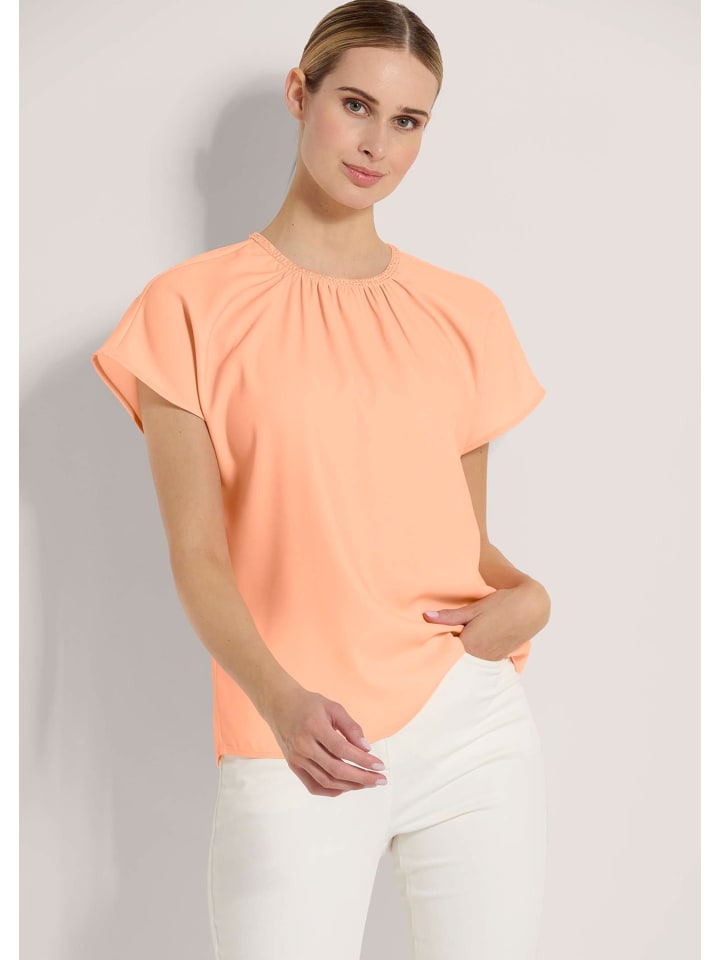 MADELEINE Блузка-рубашка с блестящим акцентом персикового цвета
MADELEINE Блузка-рубашка с блестящим акцентом персикового цвета