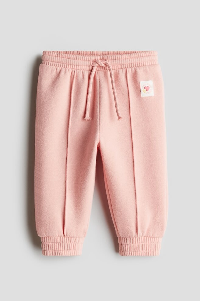 Спортивные штаны из трикотажной ткани H&M, розовый
Спортивные штаны из трикотажной ткани H&M, розовый