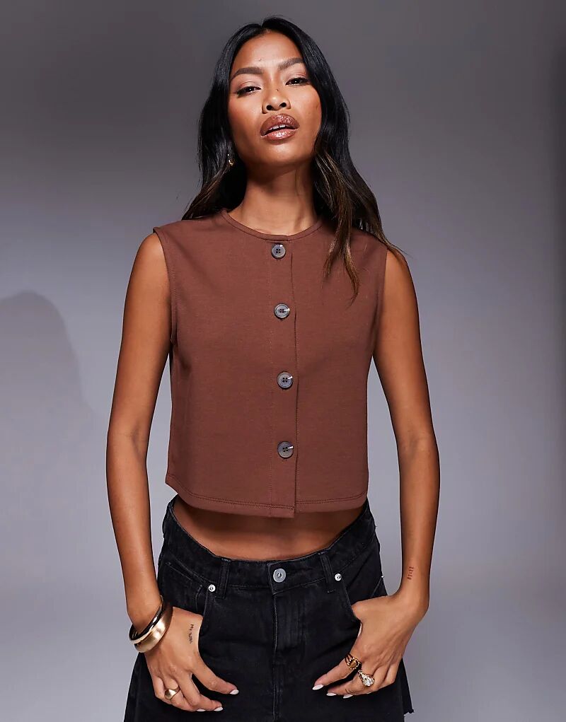 Укороченный жилет свободного кроя с широкими плечами ASOS DESIGN коричневого цвета
Укороченный жилет свободного кроя с широкими плечами ASOS DESIGN коричневого цвета