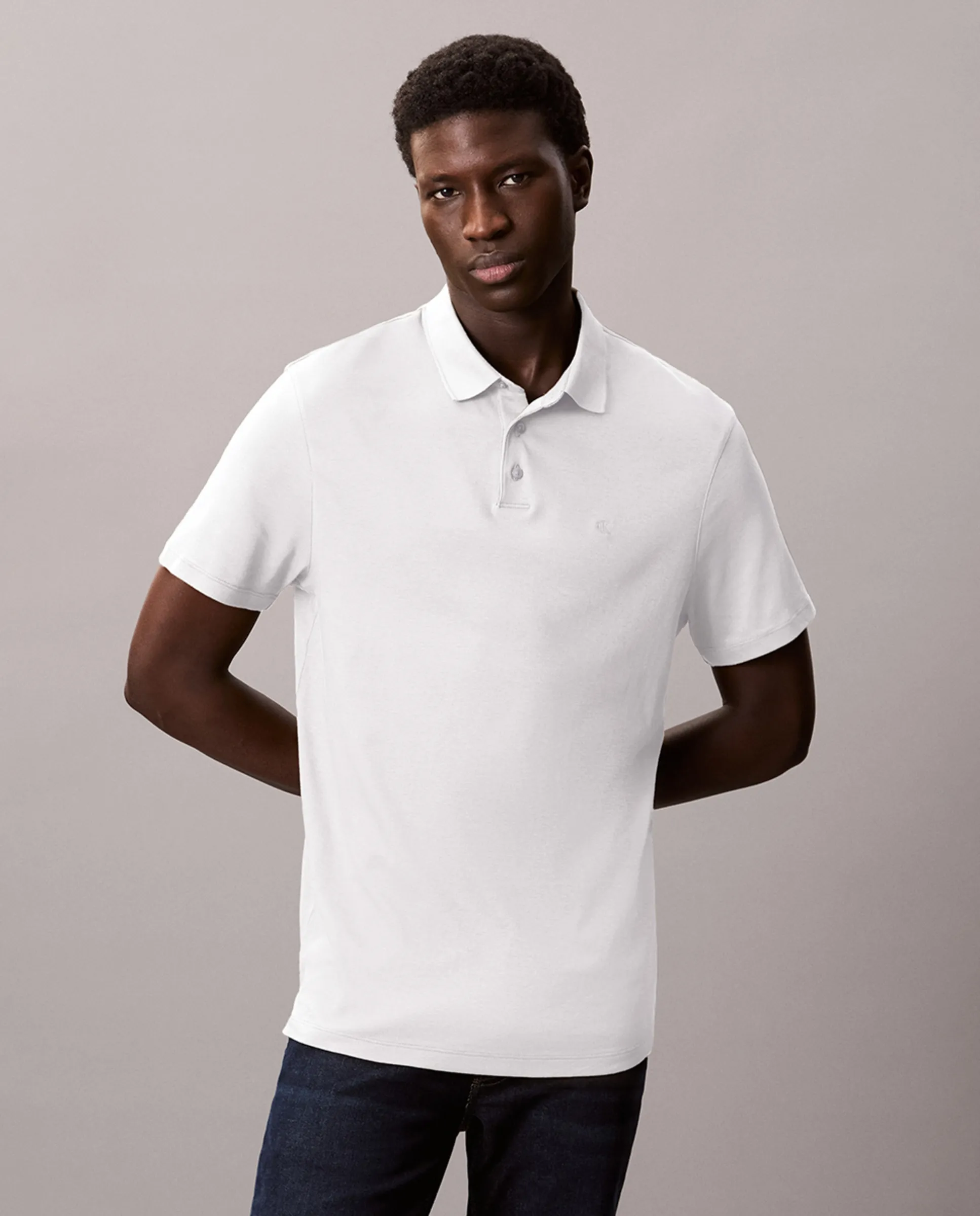 Хлопковая футболка-поло с коротким рукавом для мужчин Calvin Klein, белый 
Хлопковая футболка-поло с коротким рукавом для мужчин Calvin Klein, белый