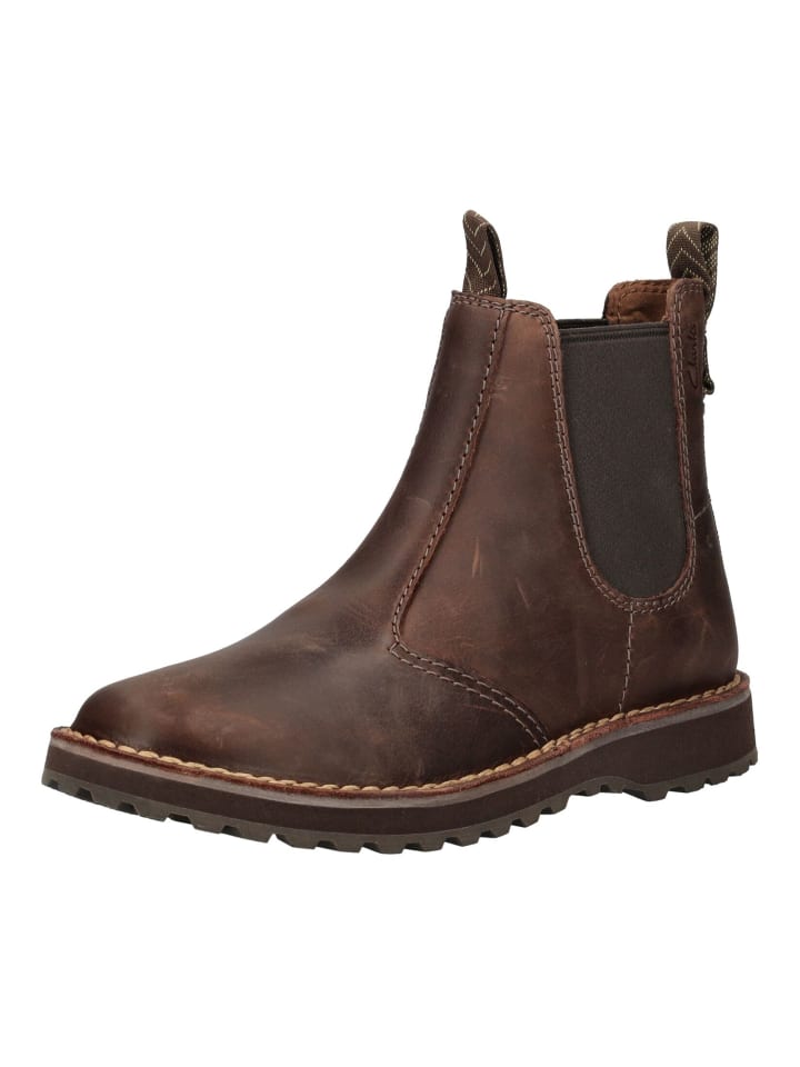 Ботильоны темно-коричневого цвета Clarks
Ботильоны темно-коричневого цвета Clarks