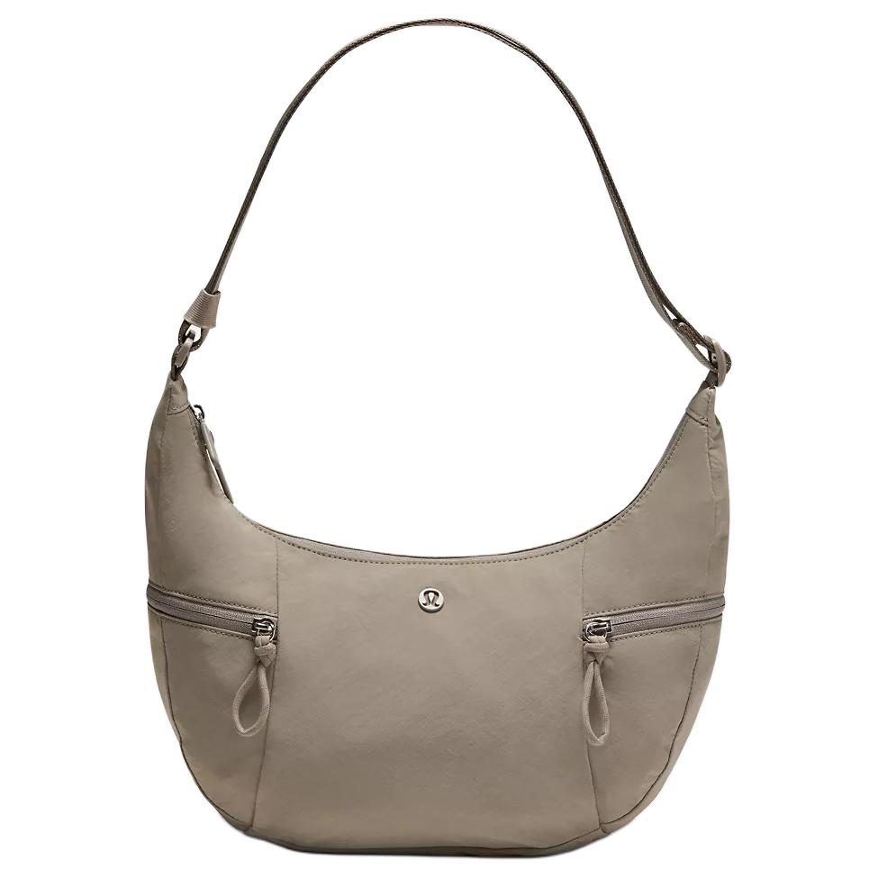 Lululemon Переработанная нейлоновая сумка через плечо унисекс теплый серый, Warm Gray
Lululemon Переработанная нейлоновая сумка через плечо унисекс теплый серый, Warm Gray