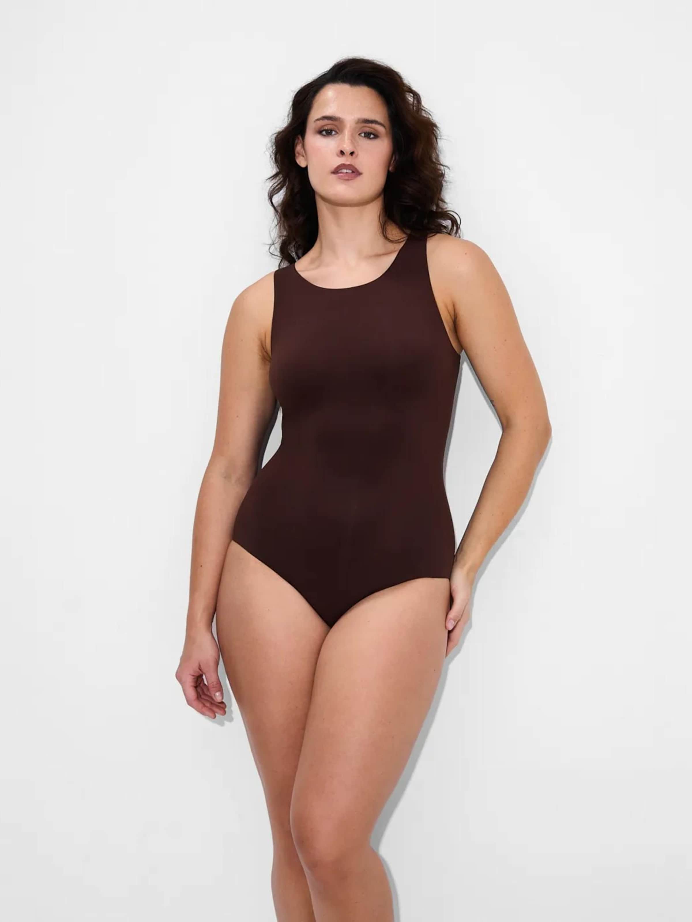 Creamy Корректирующий боди 'Crew Neck Bodysuit String' в коричневом цвете
Creamy Корректирующий боди 'Crew Neck Bodysuit String' в коричневом цвете