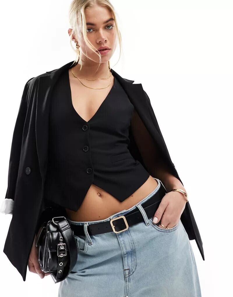 Элегантный черный жилет ASOS
Элегантный черный жилет ASOS