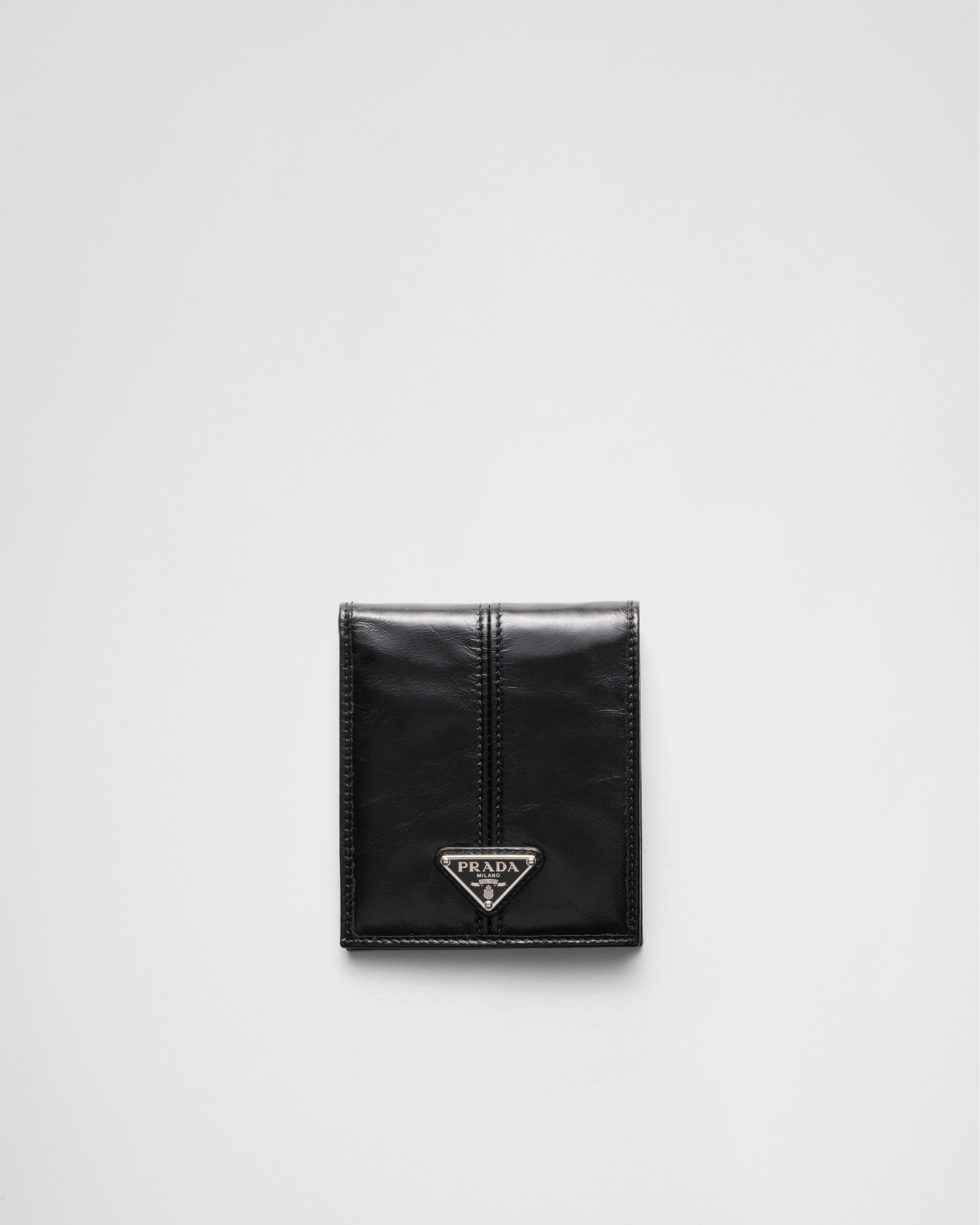 Кожаный кошелек с монетницей Prada, черный
Кожаный кошелек с монетницей Prada, черный