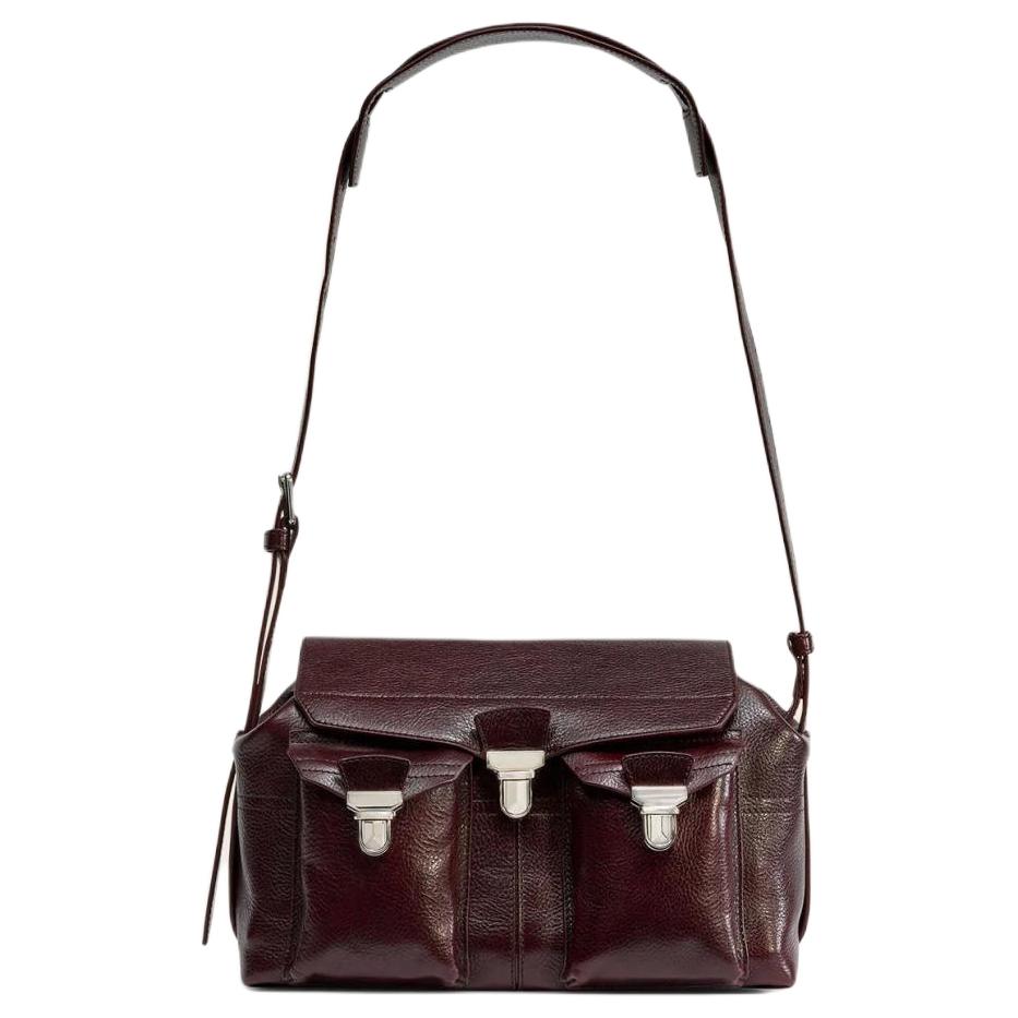 Lemaire Кожаная сумка через плечо женская черная баклажан
Lemaire Кожаная сумка через плечо женская черная баклажан