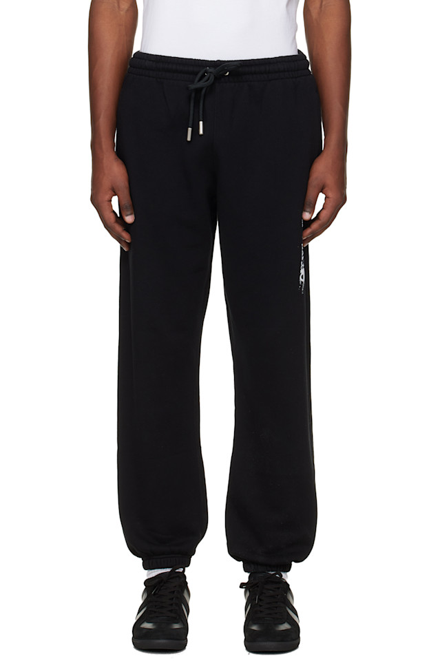 Off-White Черные чернильные спортивные штаны с манжетами в виде стрелок
Off-White Черные чернильные спортивные штаны с манжетами в виде стрелок