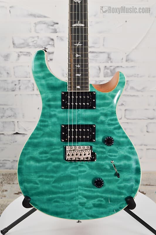 Электрогитара PRS SE Custom Quilted Carved Top Electric Guitar Turquoise w/Gig Bag
Электрогитара PRS SE Custom Quilted Carved Top Electric Guitar Turquoise w/Gig Bag