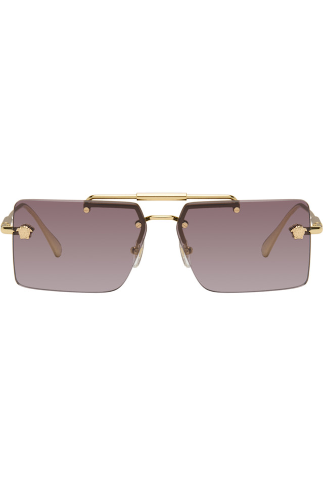 Солнцезащитные очки без оправы Versace, золото
Солнцезащитные очки без оправы Versace, золото