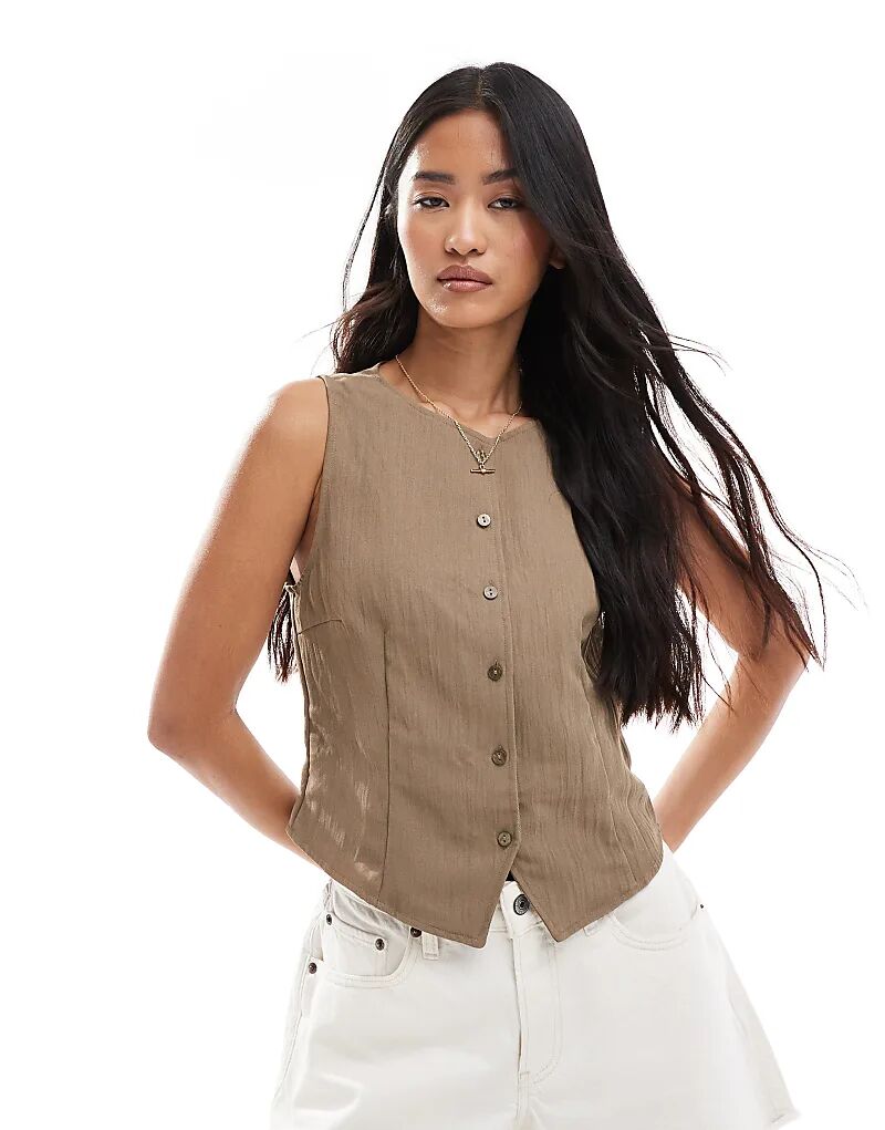 Текстурированный топ Stradivarius с пуговицами в цвете бледно-верблюжьей шерсти
Текстурированный топ Stradivarius с пуговицами в цвете бледно-верблюжьей шерсти