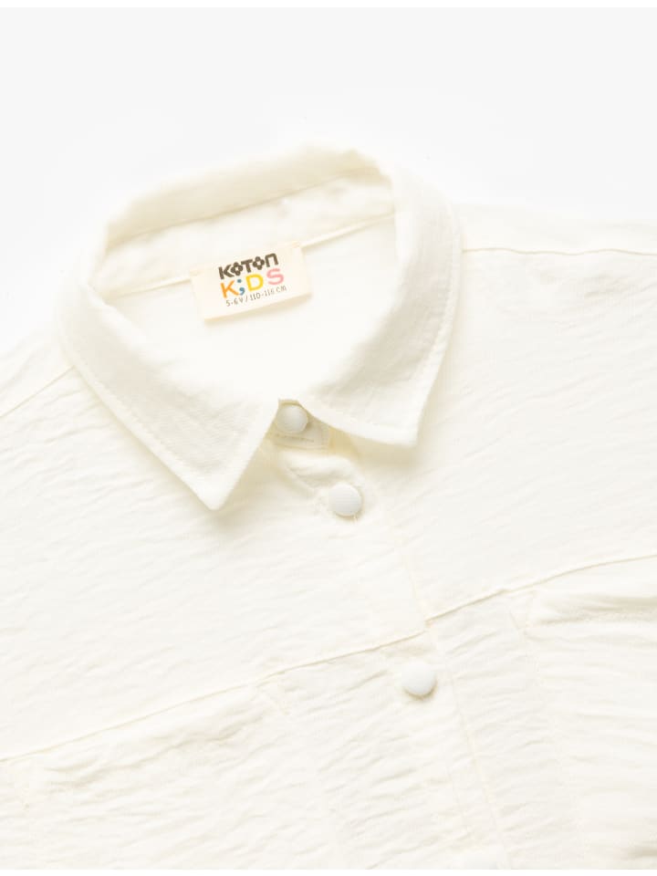Рубашка цвета экрю KOTON
Рубашка цвета экрю KOTON