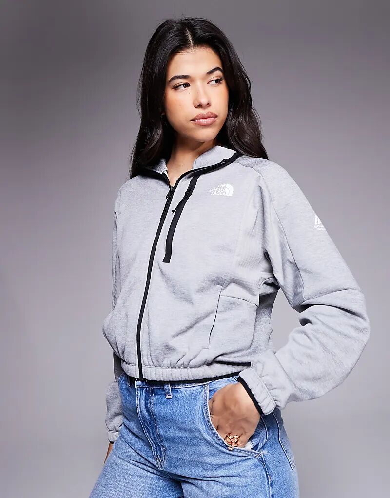 Флисовая куртка North Face Mountains Athletics на молнии серого цвета
Флисовая куртка North Face Mountains Athletics на молнии серого цвета