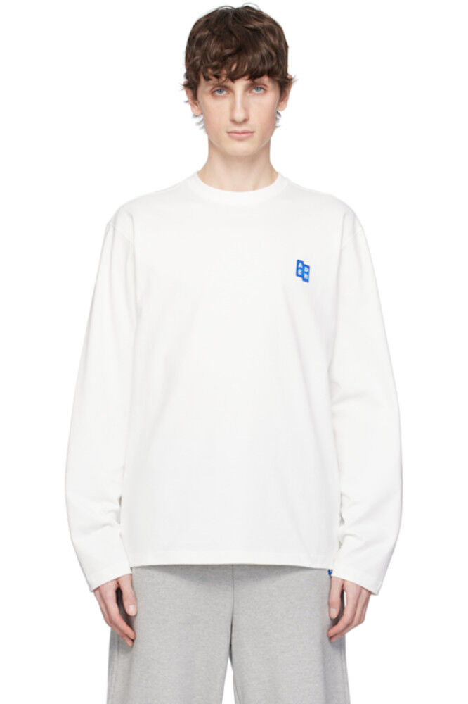 Белая подпись, TRS Tag 01 LS футболка ADER error
Белая подпись, TRS Tag 01 LS футболка ADER error