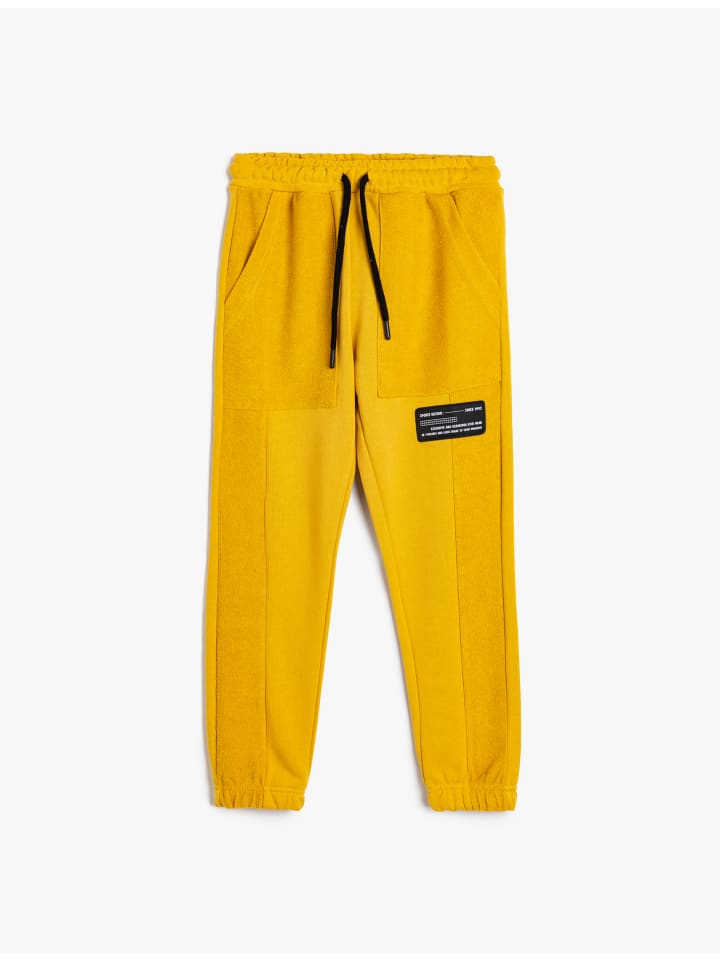 Спортивные штаны горчичного цвета KOTON
Спортивные штаны горчичного цвета KOTON