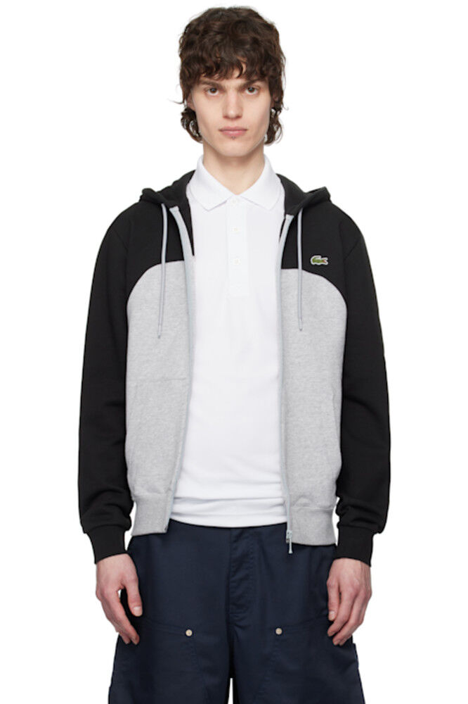 Толстовка с капюшоном на молнии в черно-сером стиле с цветными блоками Lacoste
Толстовка с капюшоном на молнии в черно-сером стиле с цветными блоками Lacoste