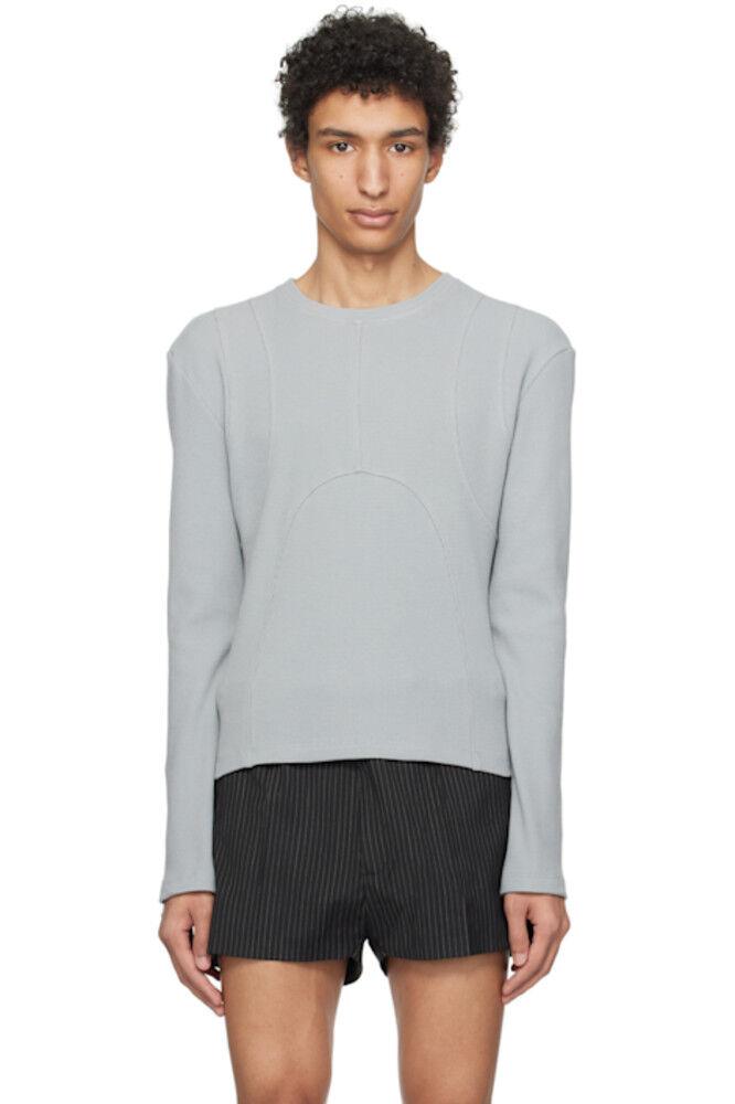 Серая футболка с длинным рукавом Dani K.NGSLEY
Серая футболка с длинным рукавом Dani K.NGSLEY