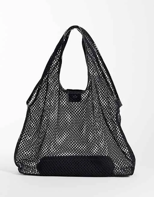 Черная сетчатая сумка-тоут ASOS DESIGN
Черная сетчатая сумка-тоут ASOS DESIGN