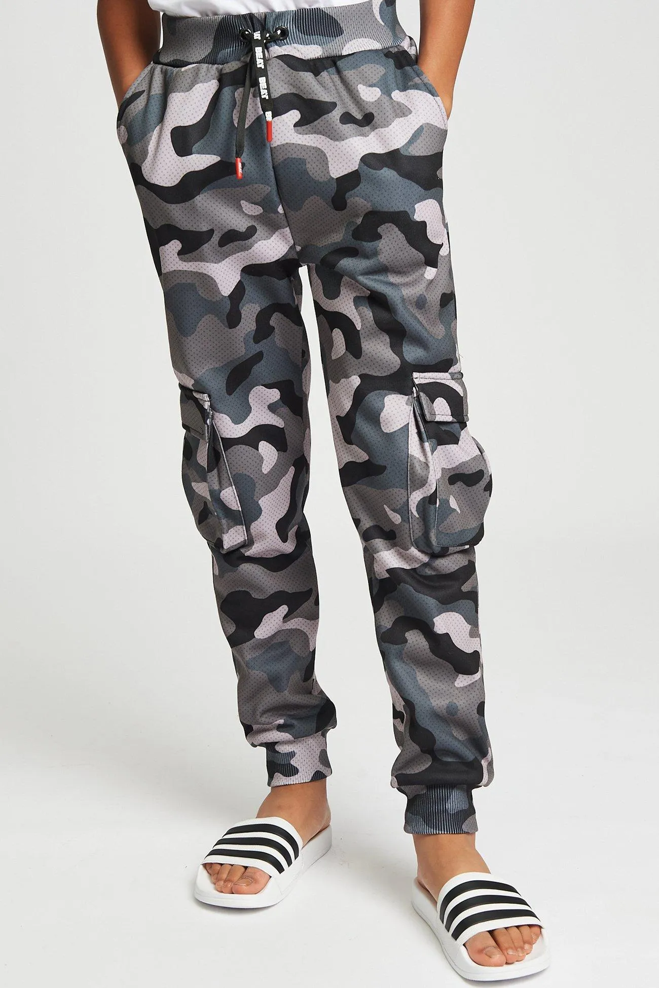 Джоггеры-карго Alpha с камуфляжным принтом Beat Boyz Club, серый
Джоггеры-карго Alpha с камуфляжным принтом Beat Boyz Club, серый