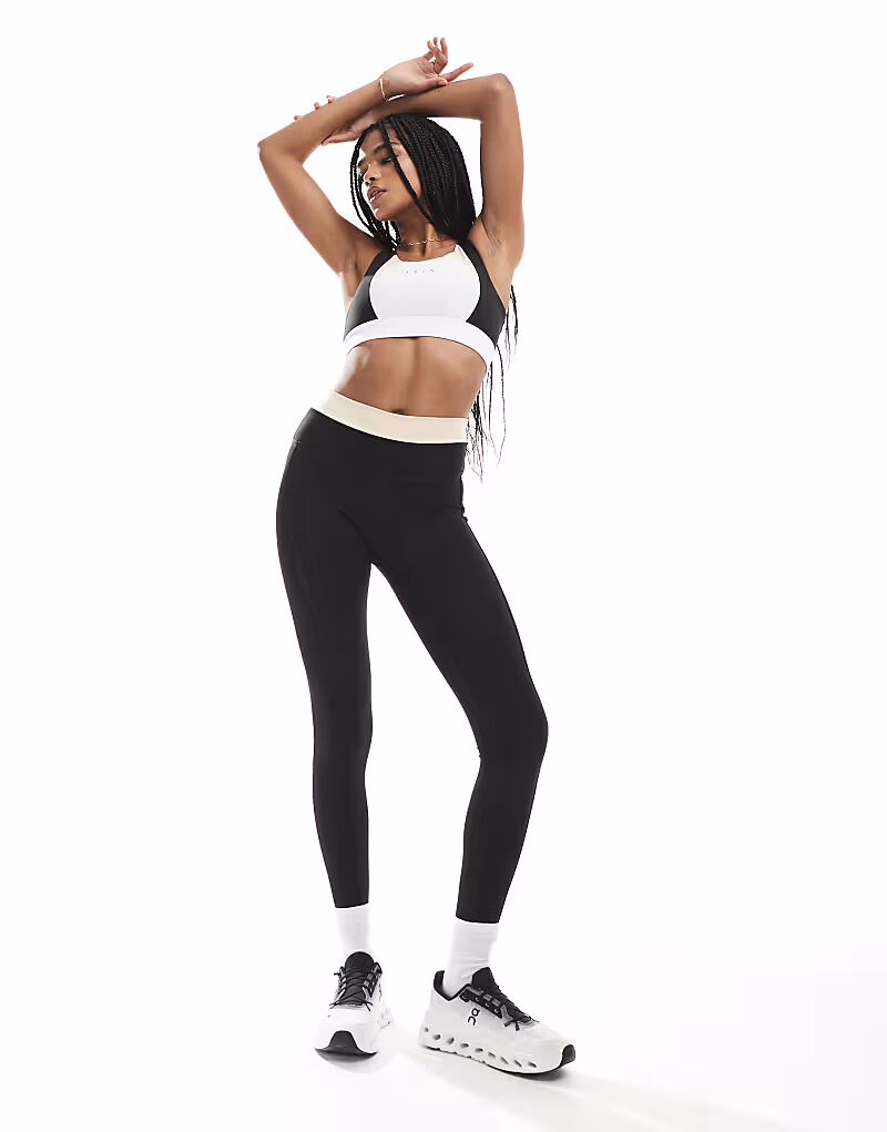 Born Living Yoga - Fiorella - Леггинсы черного и бежевого цвета
Born Living Yoga - Fiorella - Леггинсы черного и бежевого цвета