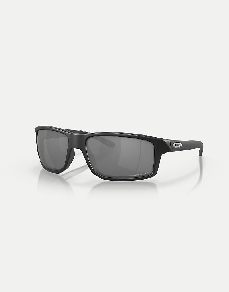 Черные прямоугольные солнцезащитные очки Oakley Gibston с серыми зеркальными поляризованными линзами
Черные прямоугольные солнцезащитные очки Oakley Gibston с серыми зеркальными поляризованными линзами