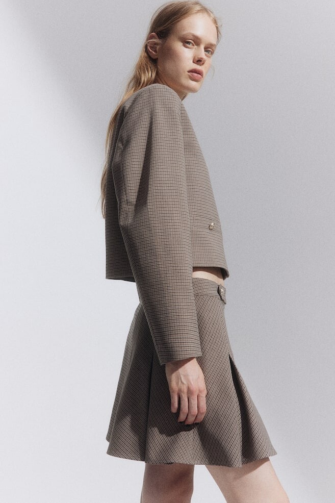 Короткая плиссированная юбка H&M, бежевый
Короткая плиссированная юбка H&M, бежевый