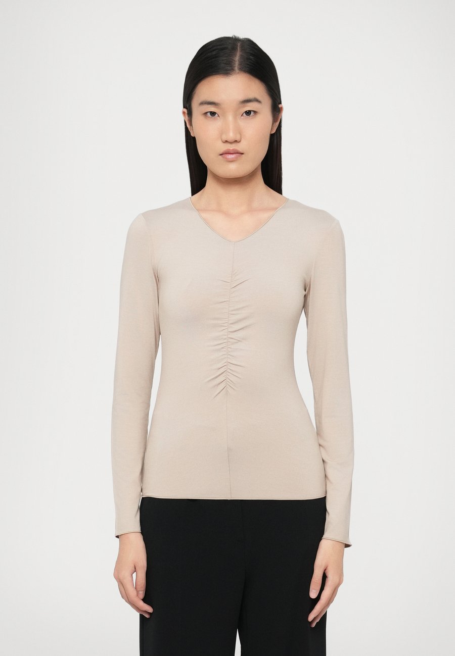 Топ Emporio Armani Long sleeved top, Cappuccino/Beige
Топ Emporio Armani Long sleeved top, Cappuccino/Beige