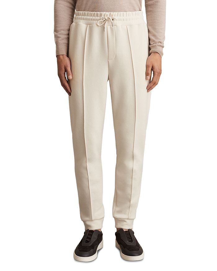 Премиальные джоггеры на шнурке Premier Interlock REISS, слоновая кость/кремовый
Премиальные джоггеры на шнурке Premier Interlock REISS, слоновая кость/кремовый