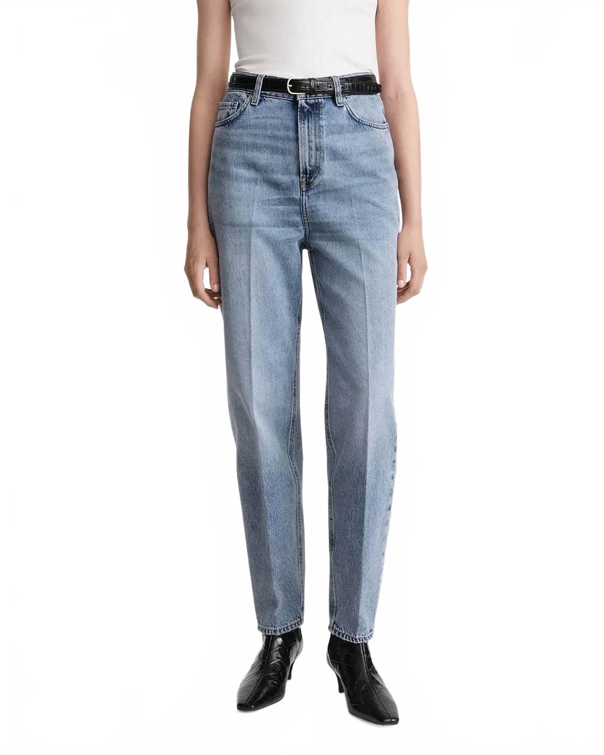 Джинсы с зауженными штанинами в потертом синем цвете Toteme
Джинсы с зауженными штанинами в потертом синем цвете Toteme