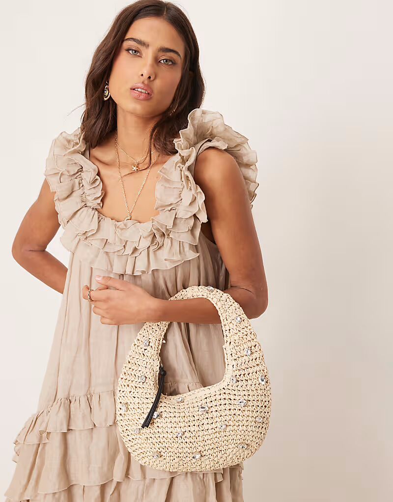 Сумка-лопатка ASOS DESIGN из соломы, связанная вручную крючком, натурального цвета с отделкой из кристаллов
Сумка-лопатка ASOS DESIGN из соломы, связанная вручную крючком, натурального цвета с отделкой из кристаллов