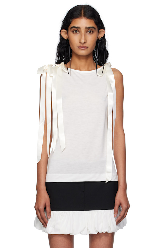 Топ-майка с бантом и разрезом сзади Simone Rocha, цвет ivory
Топ-майка с бантом и разрезом сзади Simone Rocha, цвет ivory