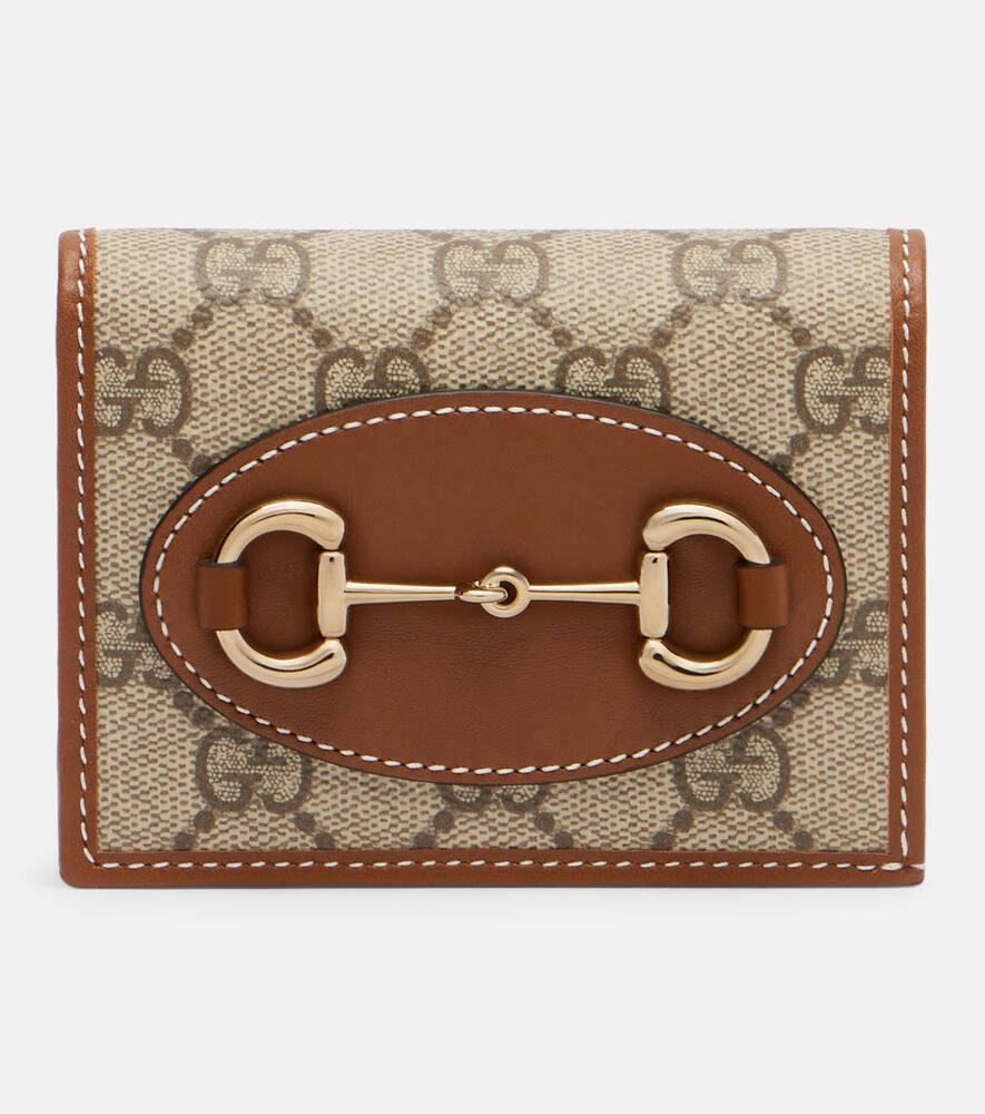Кошелёк Horsebit 1955 с кожаной отделкой Gucci, Beige and Dark Brown Canvas
Кошелёк Horsebit 1955 с кожаной отделкой Gucci, Beige and Dark Brown Canvas