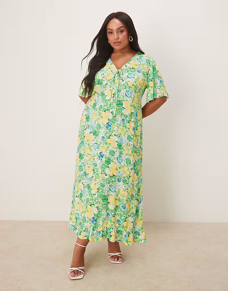 Nobody's Child Plus - платье миди Dahlia с цветочным принтом зеленого и желтого цветов
Nobody's Child Plus - платье миди Dahlia с цветочным принтом зеленого и желтого цветов