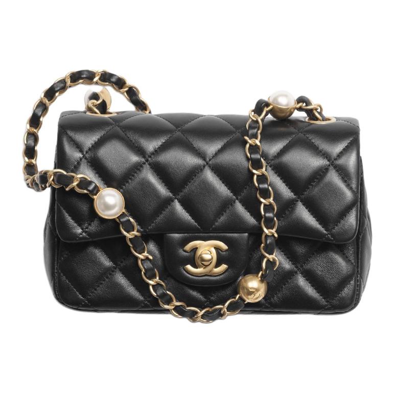 CHANEL Барсетка из овчины миниатюрная женская черная
CHANEL Барсетка из овчины миниатюрная женская черная