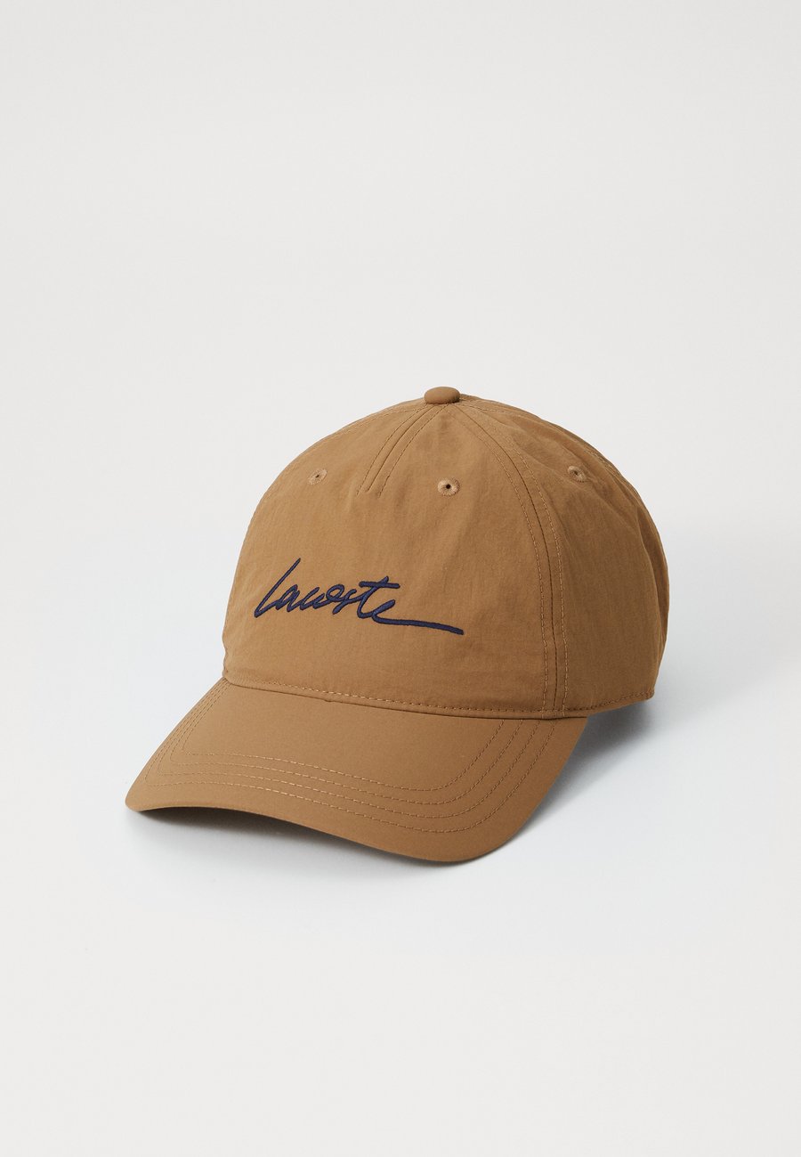 Бейсболка Lacoste CASQUETTE UNISEX, Cookie/Sand
Бейсболка Lacoste CASQUETTE UNISEX, Cookie/Sand