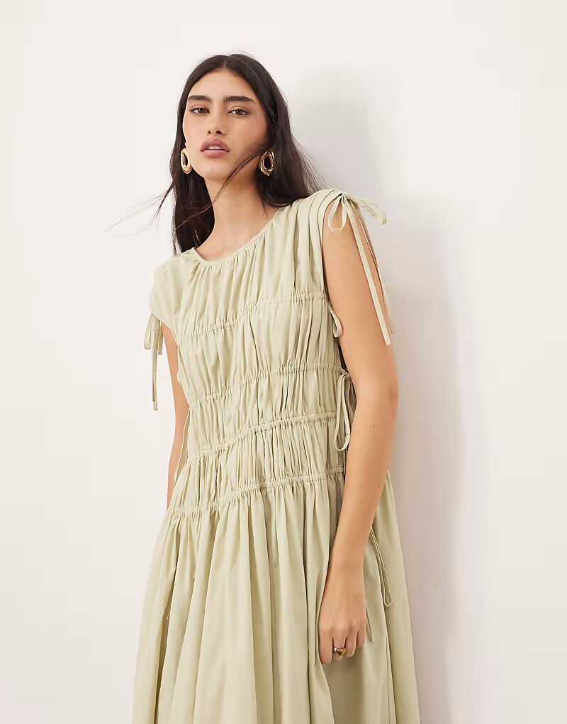 ARRANGE чистое хлопковое трапециевидное платье миди с завязками и карманами в стираном шалфейном цвете
ARRANGE чистое хлопковое трапециевидное платье миди с завязками и карманами в стираном шалфейном цвете