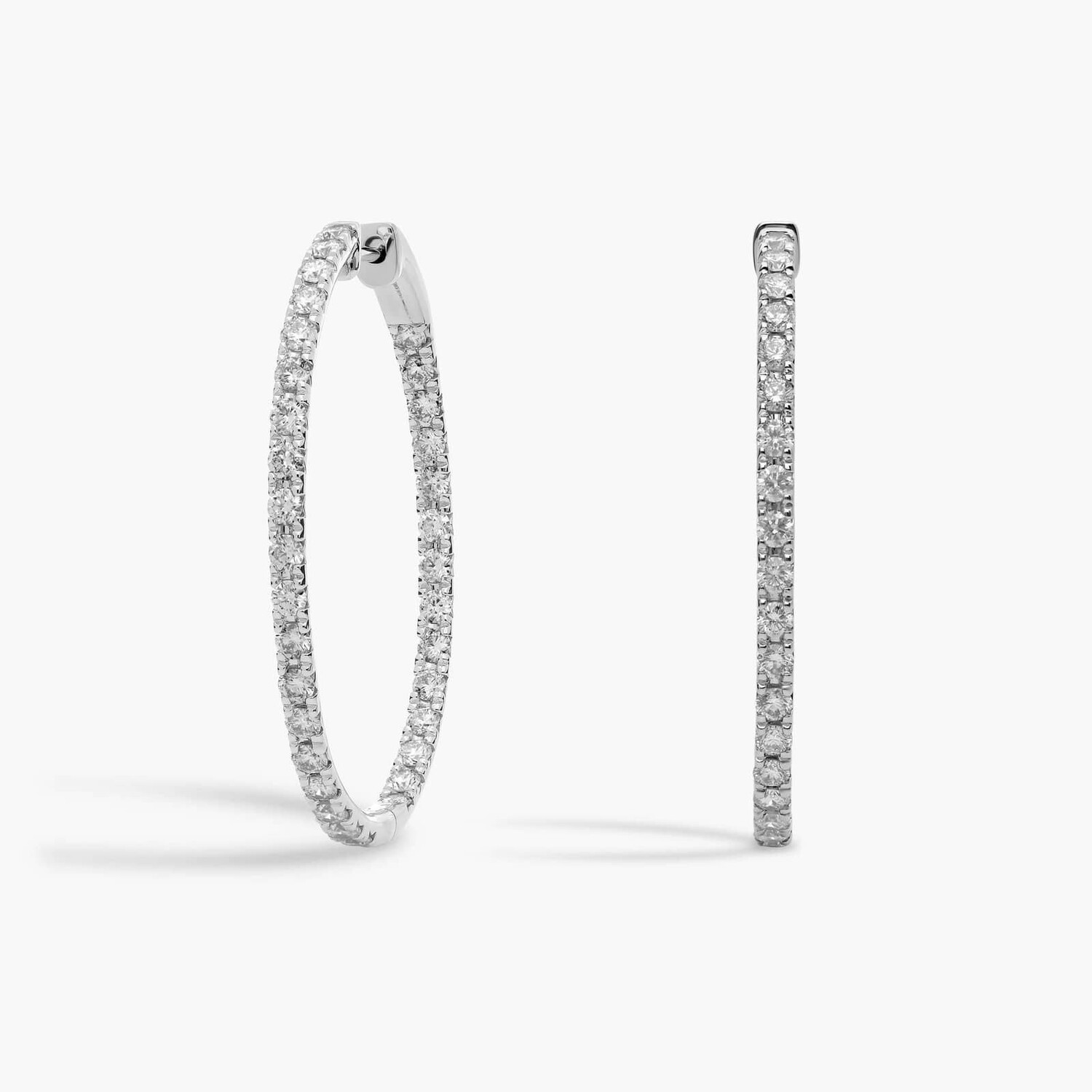 Серьги-кольца Eternity French Pavé Oval из 14-каратного белого золота (2 1/2 карата) Blue Nile
Серьги-кольца Eternity French Pavé Oval из 14-каратного белого золота (2 1/2 карата) Blue Nile