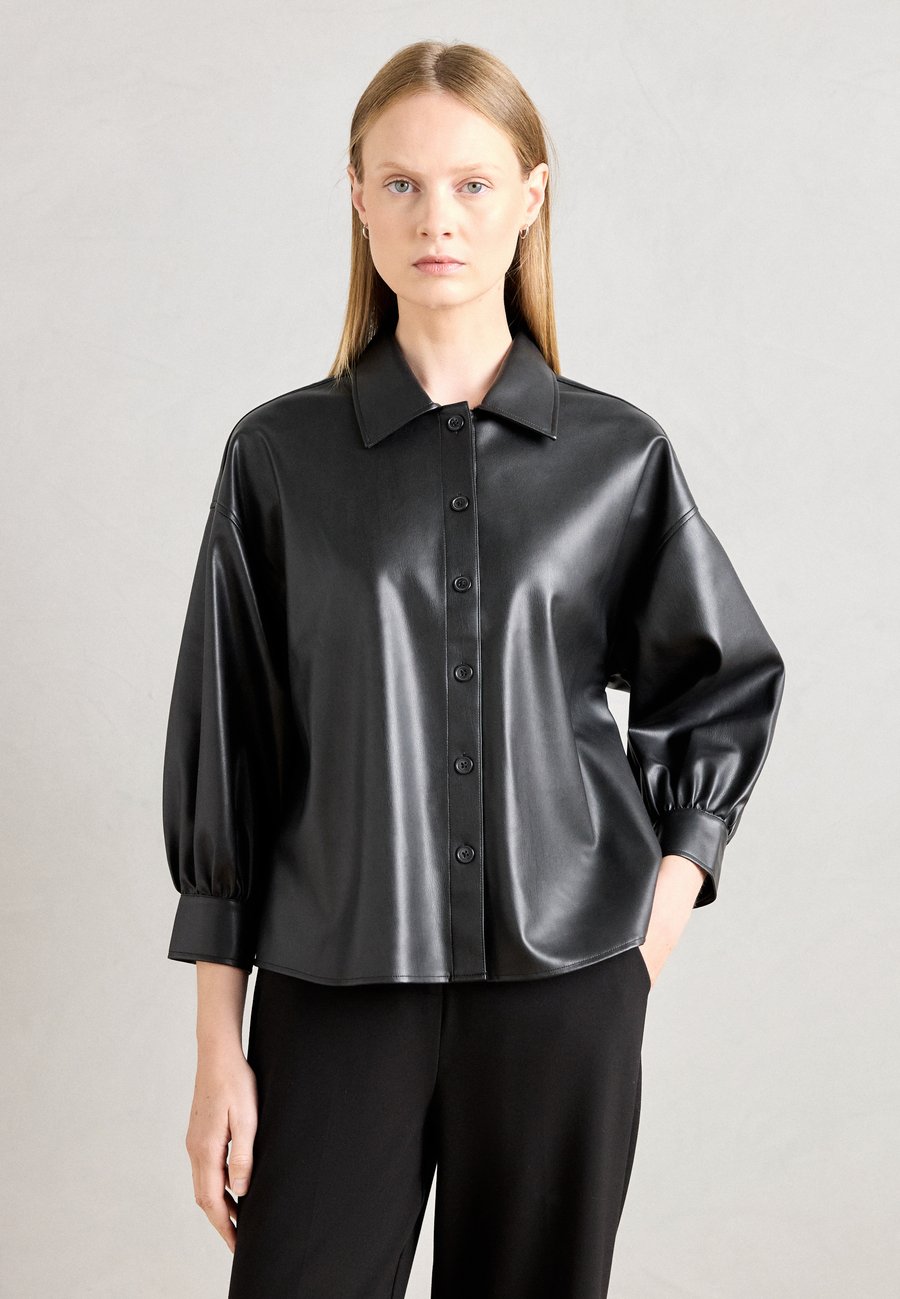 Блуза Lindex SHIRT IRIS, Black
Блуза Lindex SHIRT IRIS, Black