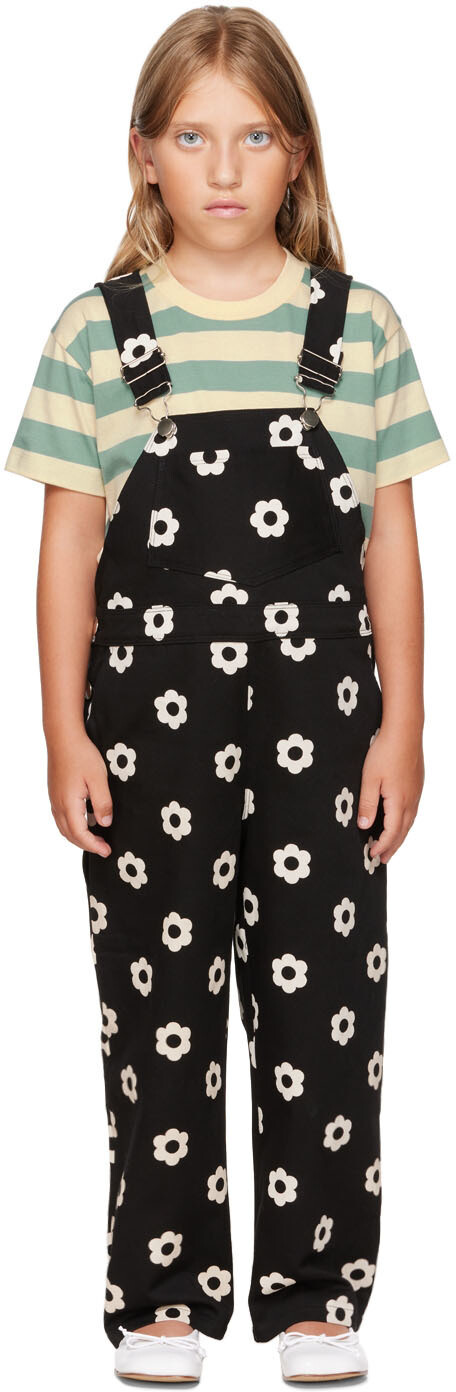 Эксклюзивный детский черный комбинезон SSENSE Daisy même.
Эксклюзивный детский черный комбинезон SSENSE Daisy même.