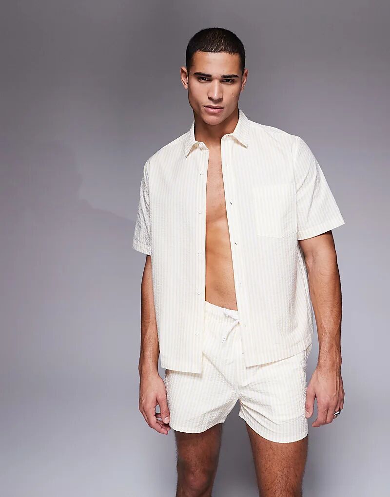 Рубашка свободного кроя оверсайз от ASOS DESIGN в желтую полоску из сирсакера
Рубашка свободного кроя оверсайз от ASOS DESIGN в желтую полоску из сирсакера