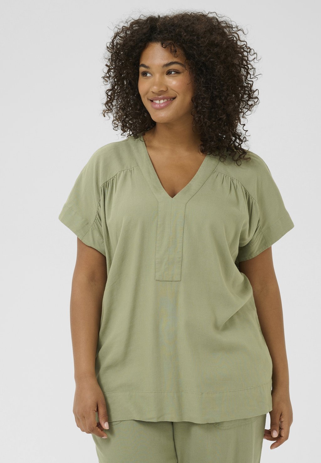 Блуза MILLE WING Kaffe Curve, зеленый
Блуза MILLE WING Kaffe Curve, зеленый