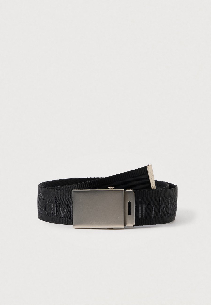 Ремень Calvin Klein LOGO WEBBING PLAQUE, Black
Ремень Calvin Klein LOGO WEBBING PLAQUE, Black