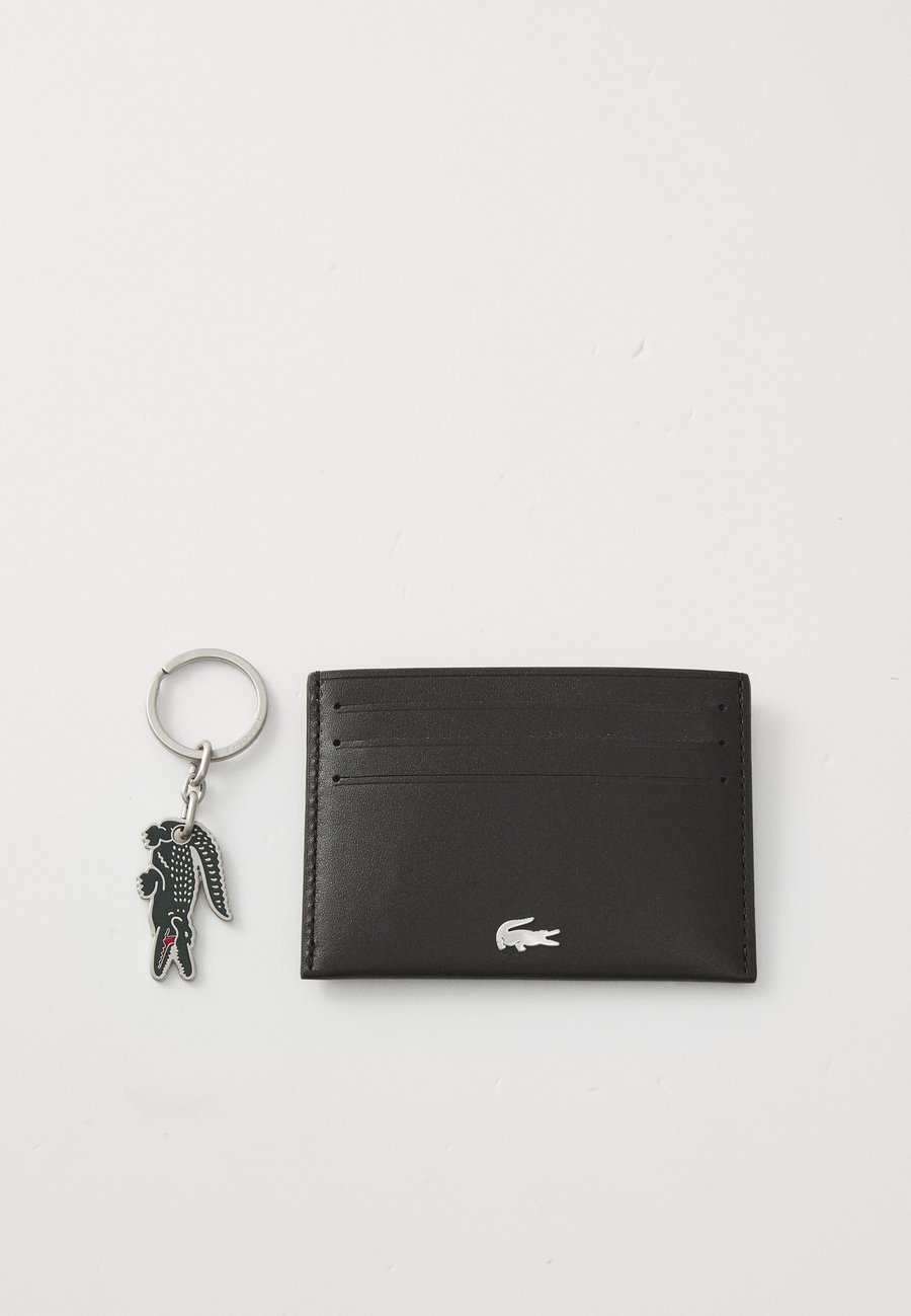 Кошелек Lacoste MONEY PIECES, Noir/Black
Кошелек Lacoste MONEY PIECES, Noir/Black
