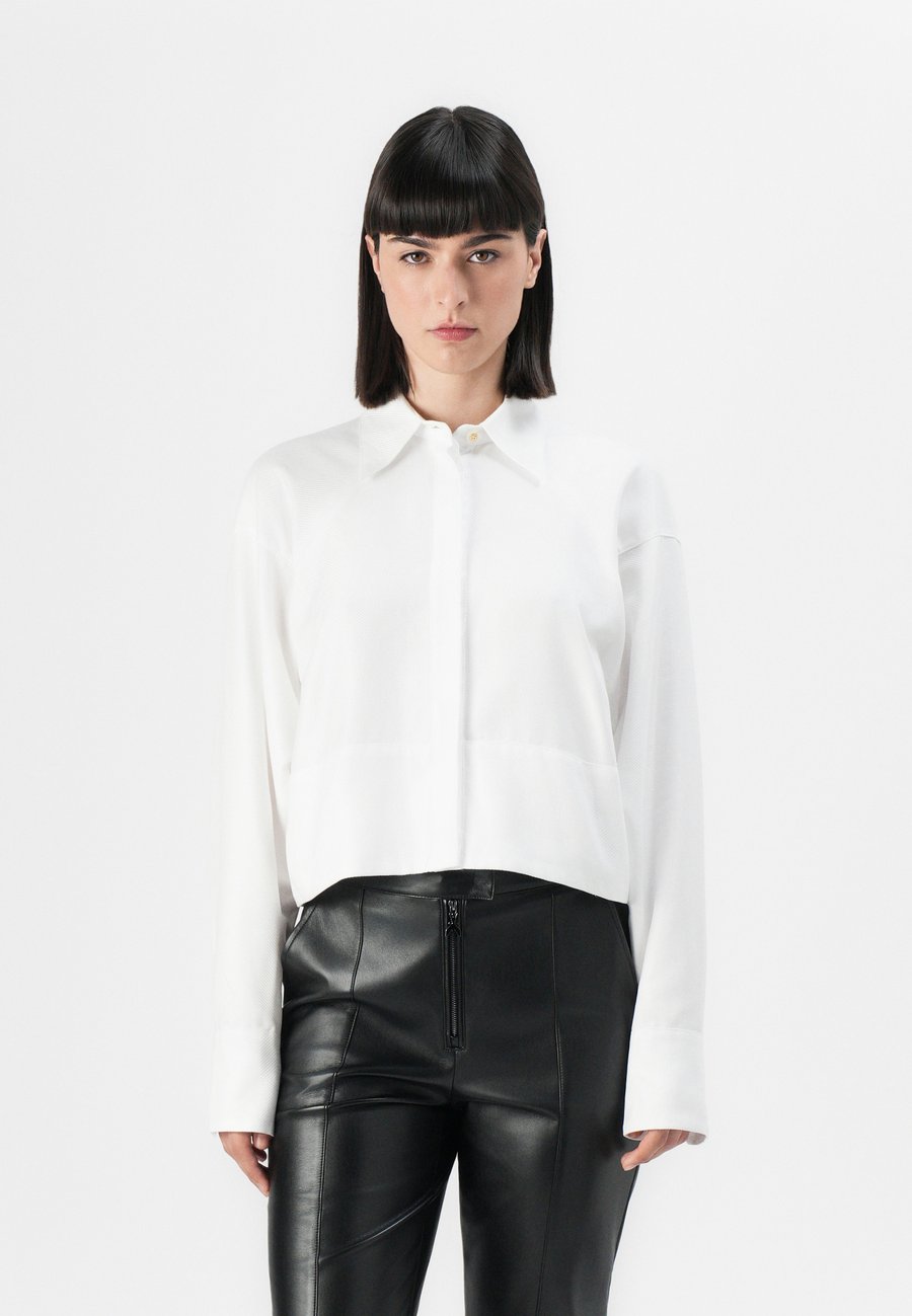 Блуза Elisabetta Franchi WOMEN BLOUSE, Bianco/White
Блуза Elisabetta Franchi WOMEN BLOUSE, Bianco/White