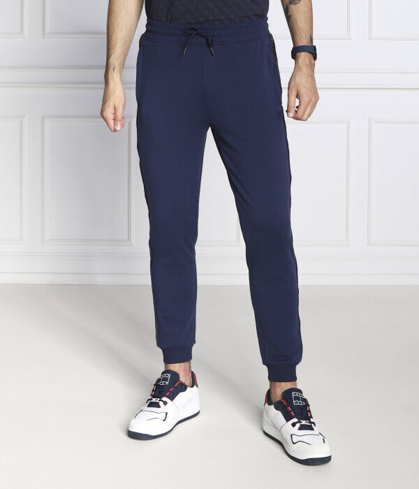 Спортивные брюки мужские Guess Active Arlo джоггеры однотонные, синий
Спортивные брюки мужские Guess Active Arlo джоггеры однотонные, синий