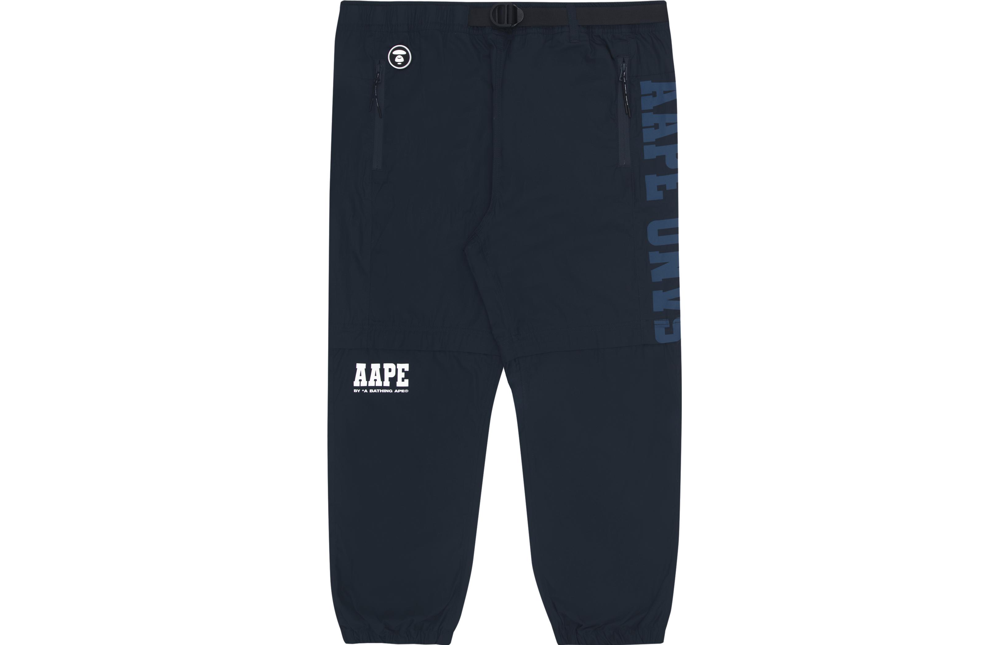 Брюки с аппликацией логотипа суженные Aape, синий
Брюки с аппликацией логотипа суженные Aape, синий