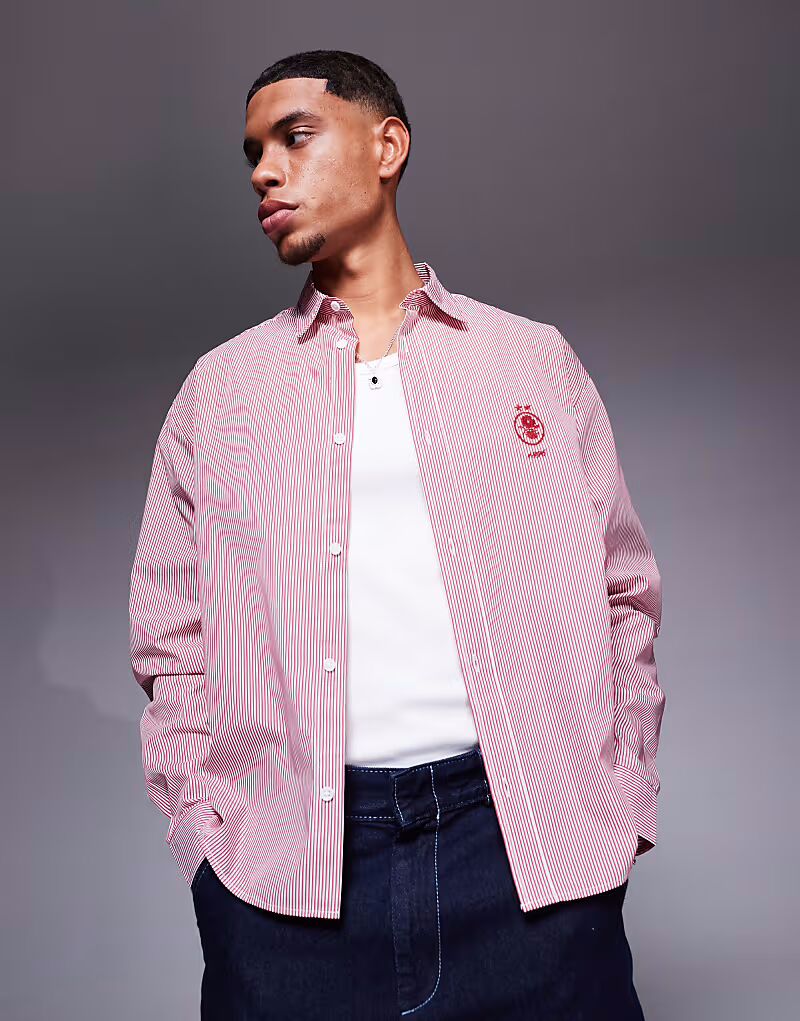 Рубашка свободного кроя в полоску с вышивкой на груди от ASOS DESIGN
Рубашка свободного кроя в полоску с вышивкой на груди от ASOS DESIGN