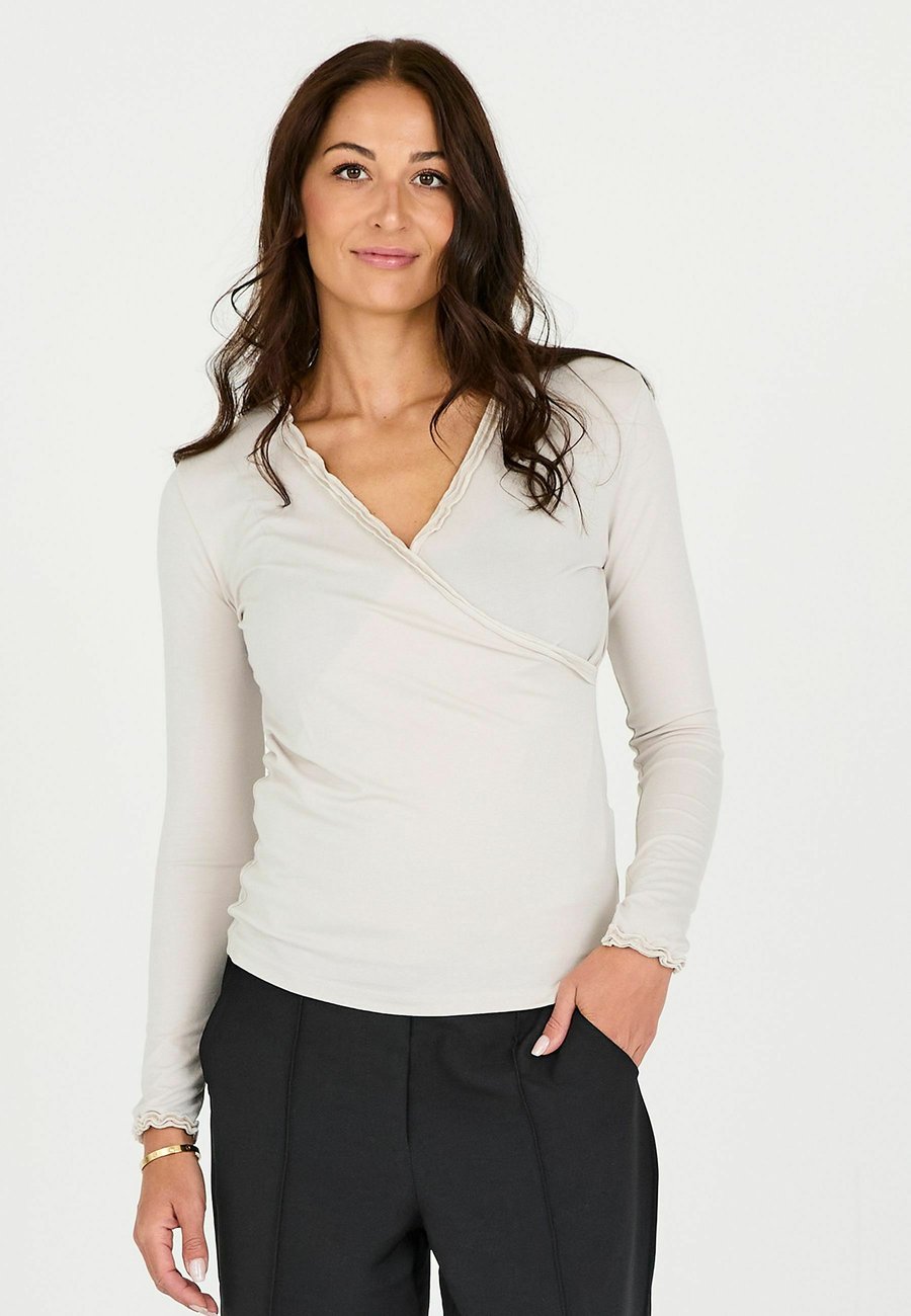 Топ NÜ Denmark ADELE WRAP, Bone/Off-White
Топ NÜ Denmark ADELE WRAP, Bone/Off-White