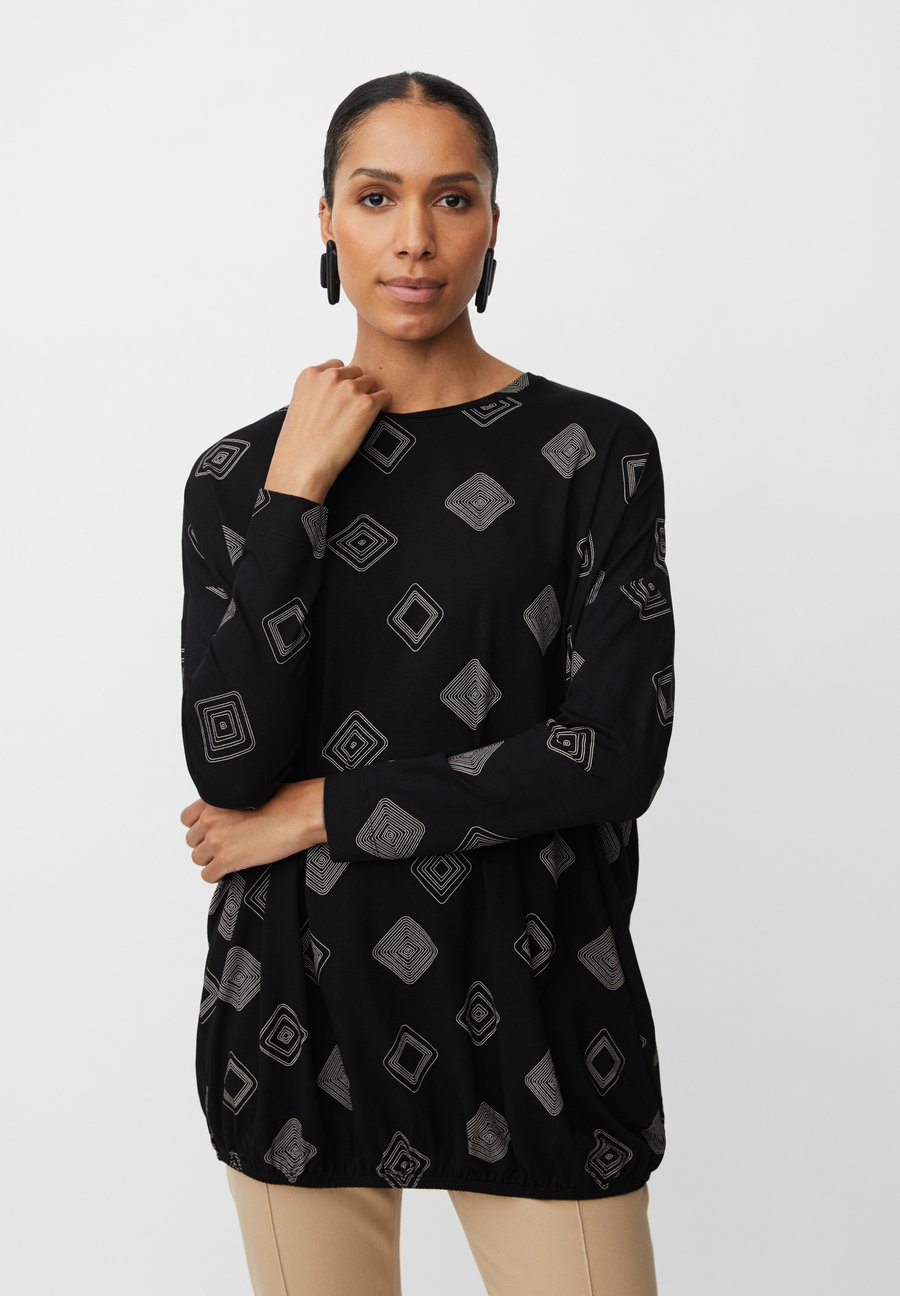 Топ Masai MaBaggy, Schwarz/Black
Топ Masai MaBaggy, Schwarz/Black