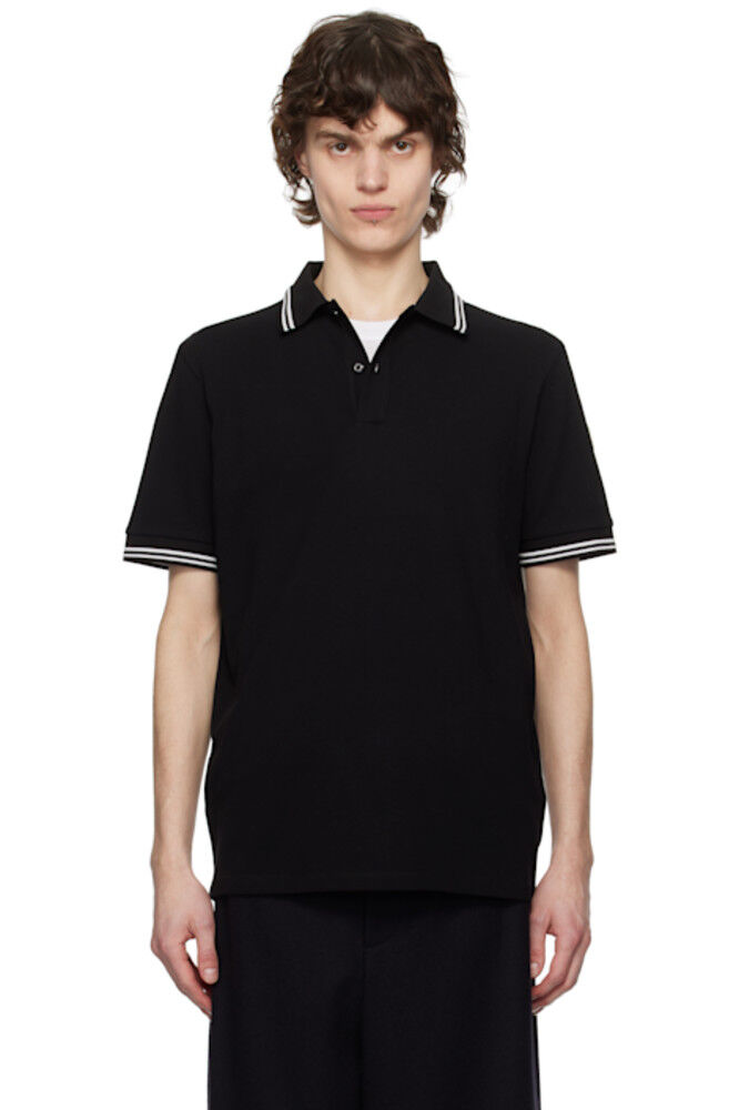 Поло из хлопкового пике с черной полосатой отделкой Moncler
Поло из хлопкового пике с черной полосатой отделкой Moncler